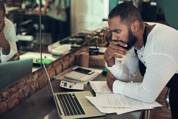 business owner reviewing his finances